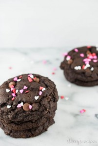 Double Chocolate Valentines Day Cookies - Thick, brownie-like cookies filled with chocolate chips topped with sprinkles - the perfect Valentines Day cookie! | www.staceysrecipes.com