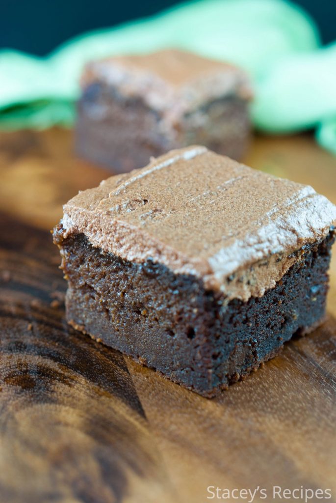 Treat yourself to these grain free, chocolately brownies packed with sweet potatoes and peanut butter. Smother them in a mocha frosting and enjoy! | https://www.staceysrecipes.com